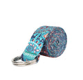 Rolled printed yoga strap in teal, navy and coral with a metal D-ring buckle