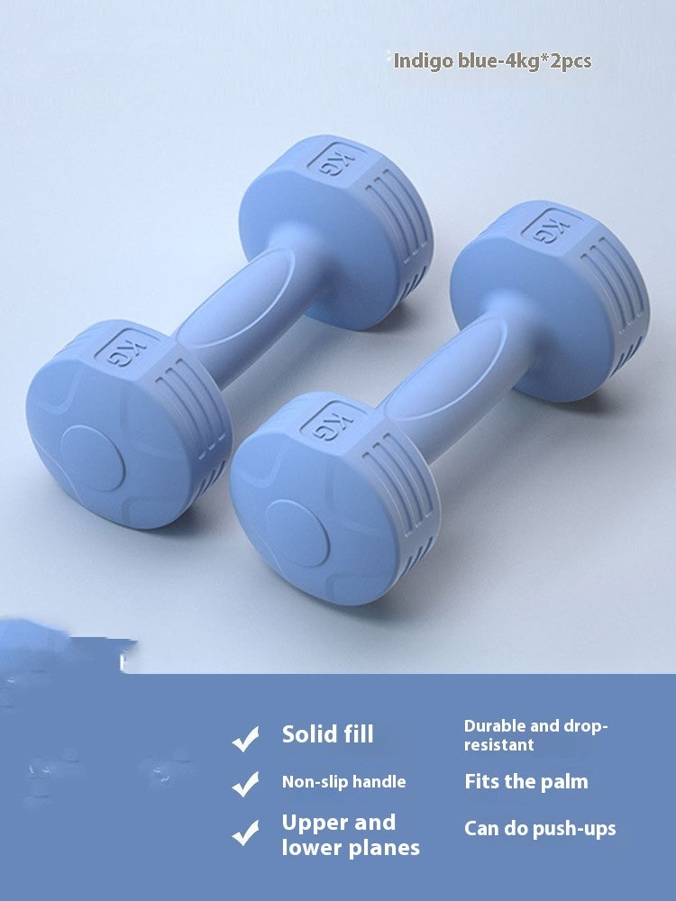 Pair of indigo blue 4 kg soft-touch dumbbells on a light blue background