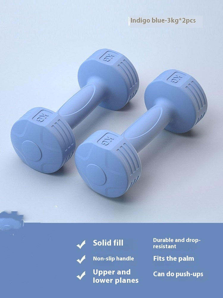 Pair of indigo blue 3 kg soft-touch dumbbells on a light blue background