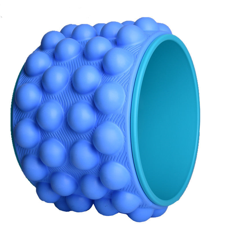 Blue spiky yoga wheel with a light blue inner rim