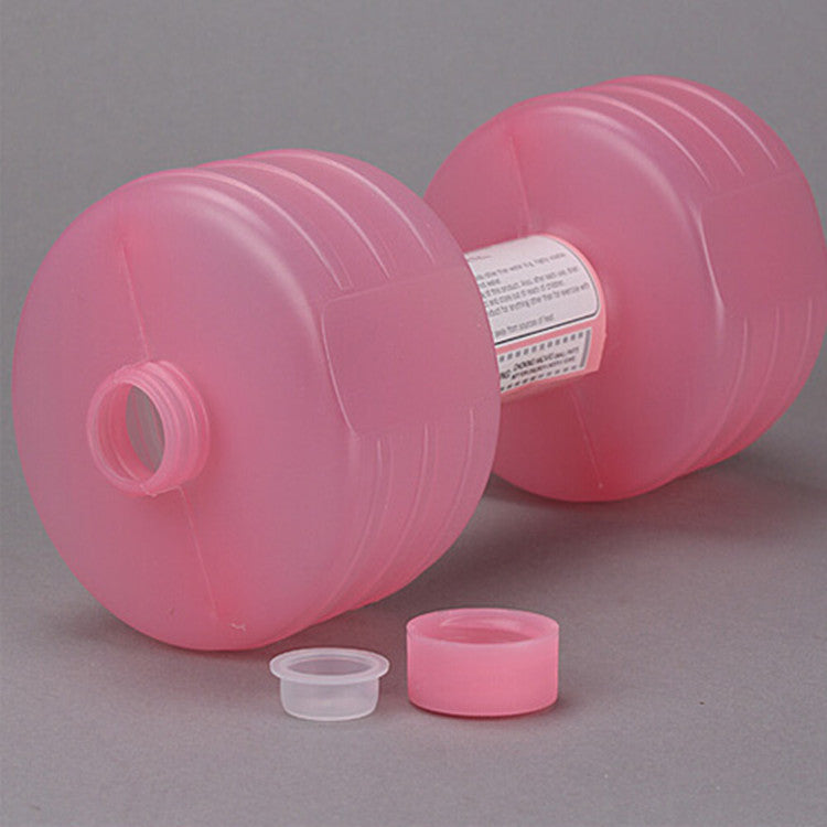 Empty pink water-fill dumbbell with its inner plug and screw cap removed