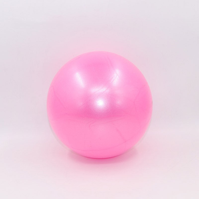 Pink mini Pilates ball with a glossy finish