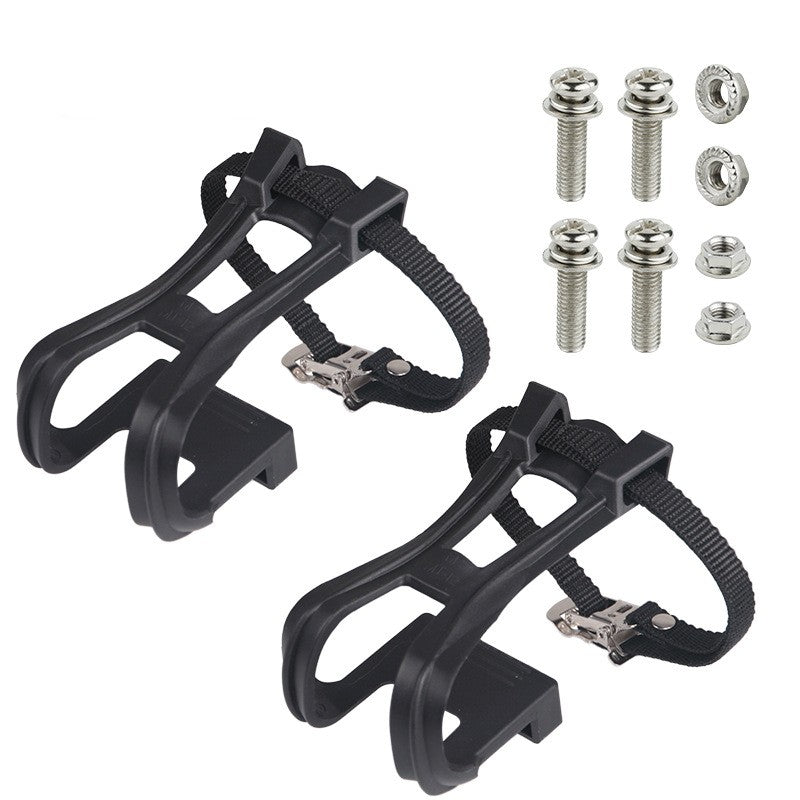 Two black toe cages with straps fitted, beside a set of mounting bolts and nuts