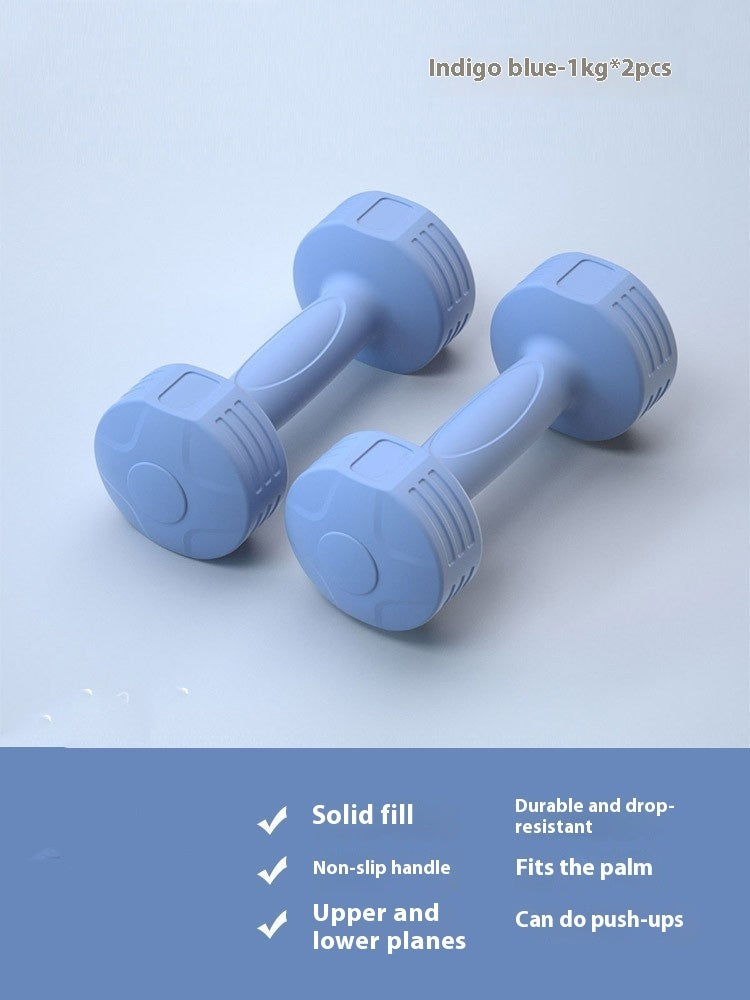 Pair of indigo blue 1 kg soft-touch dumbbells on a light blue background