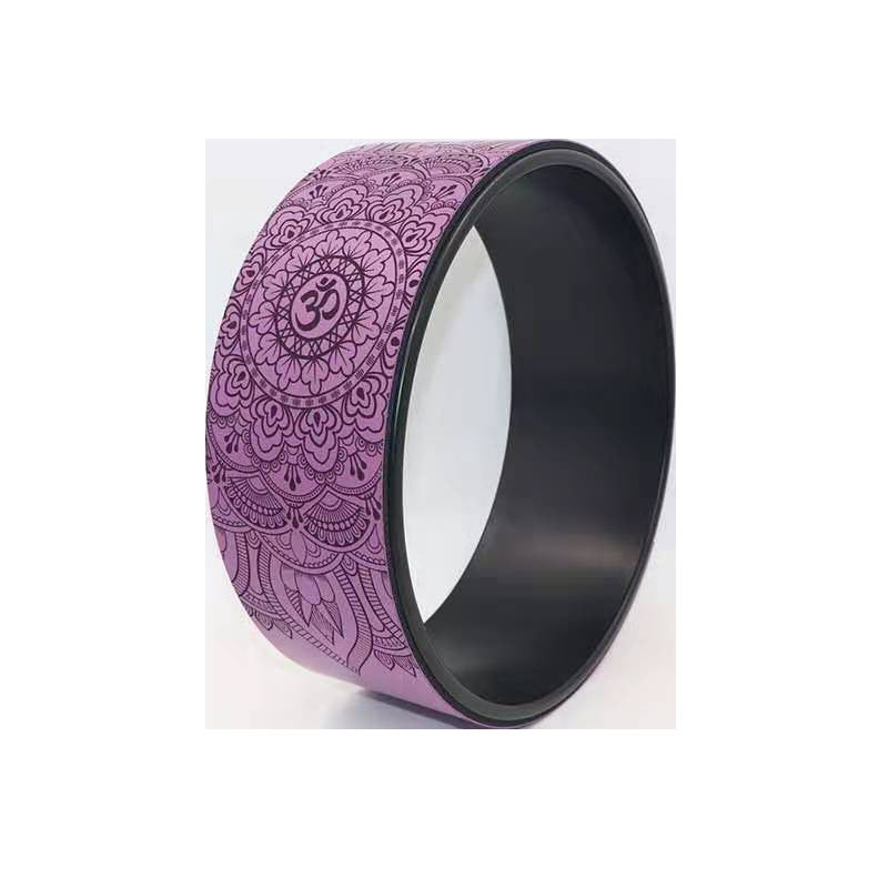 Mauve yoga wheel with an embossed mandala and om pattern and a black inner rim