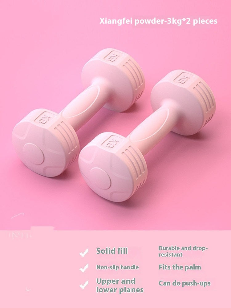 Pair of pink 3 kg soft-touch dumbbells on a pink background