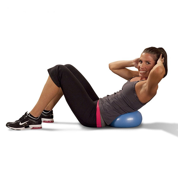 Woman doing a crunch with a blue mini Pilates ball under her lower back