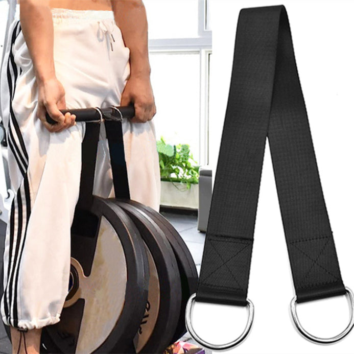 Person holding a black nylon load belt with metal D-rings, with weight plates hanging from it