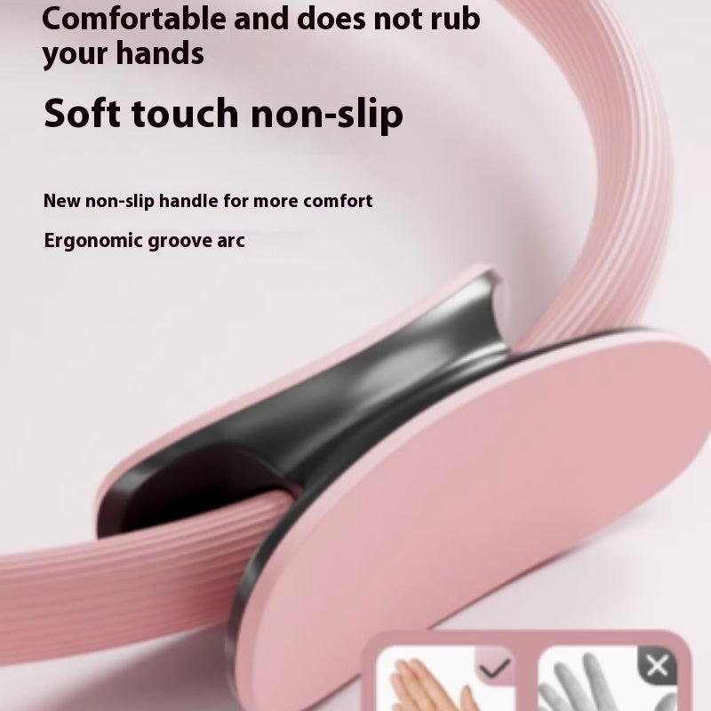 Close-up of the Pilates ring's non-slip handle and ribbed outer cover