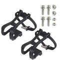 Pair of black toe cages with adjustable straps for exercise bike pedals, with mounting bolts and nuts