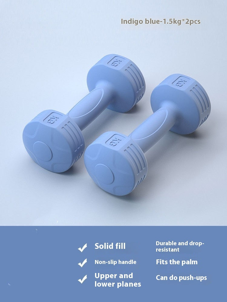 Pair of indigo blue 1.5 kg soft-touch dumbbells on a light blue background