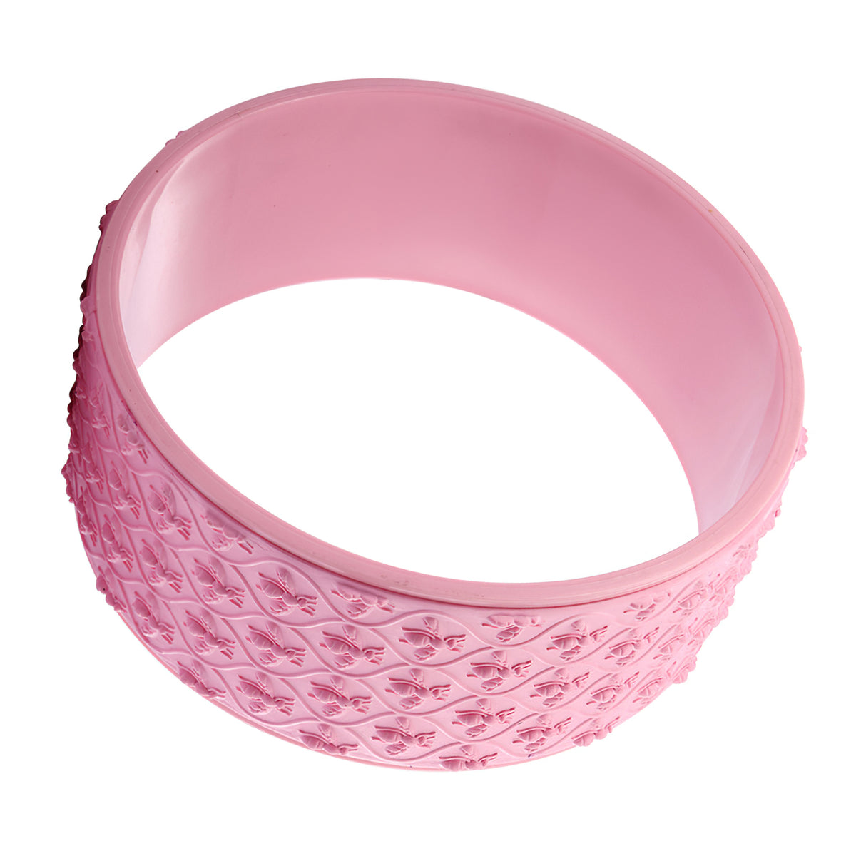 Pink yoga wheel with a raised massage-point surface